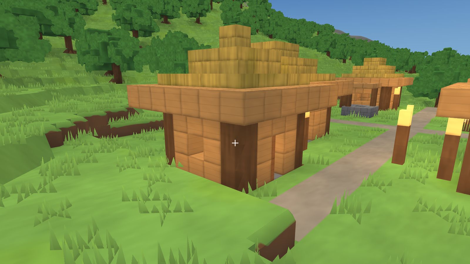 A timber cottage built on a village plot
