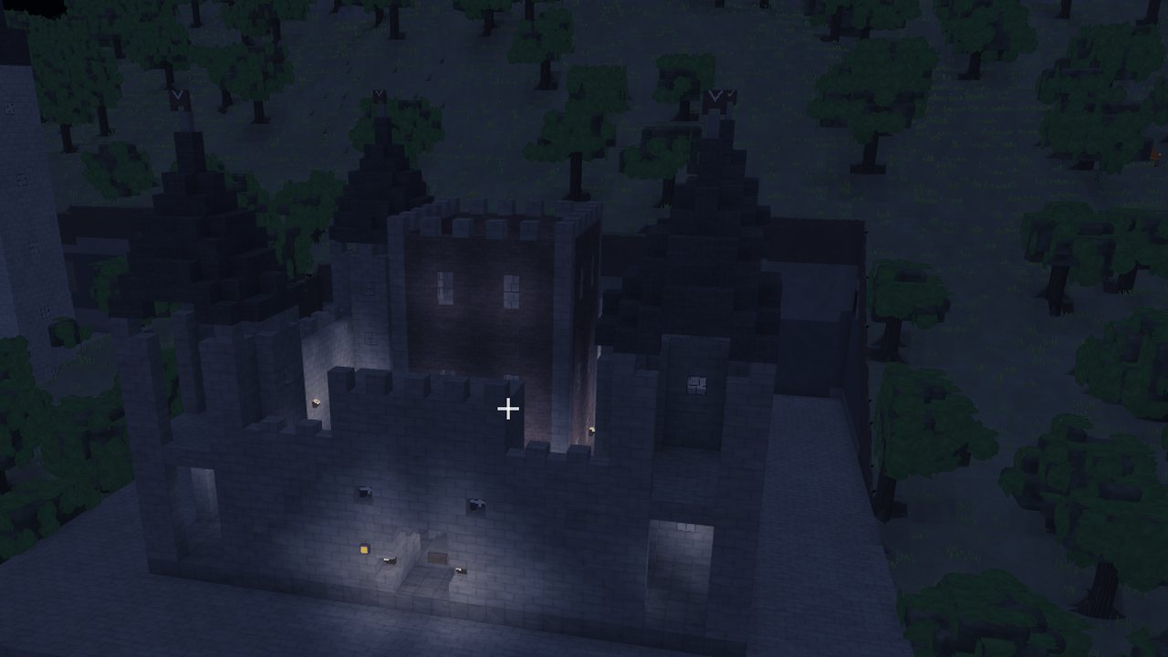 A stone castle at night lit from inside by its own candles and sconces