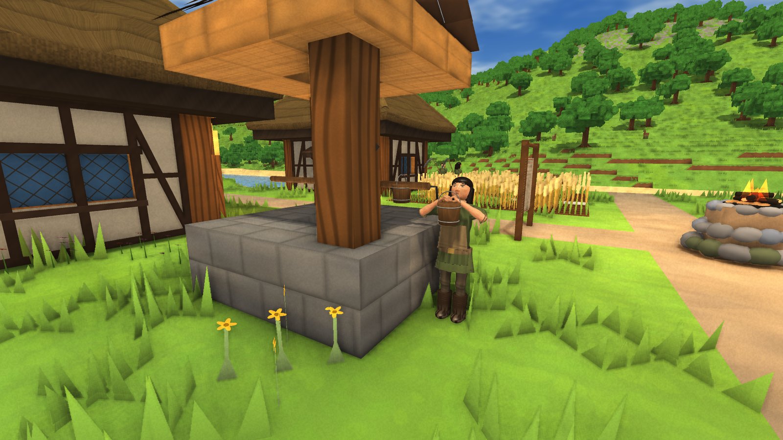 A villager at the stone well in the village square